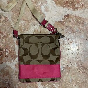 Pink crossbody Coach bag